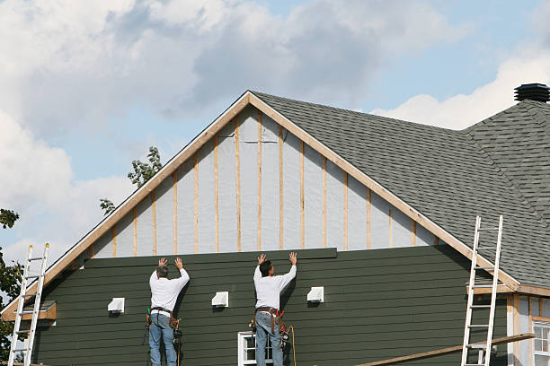 Professional Siding Replacement technician working in Keller, TX